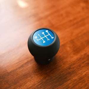 Jeep JL & JT shift knob — anodized aluminum faceplate detail