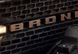 2021+ Ford Bronco Grille Lettering Overlay Kit, Bronze — Ford Racing (M-1447-BLBR)